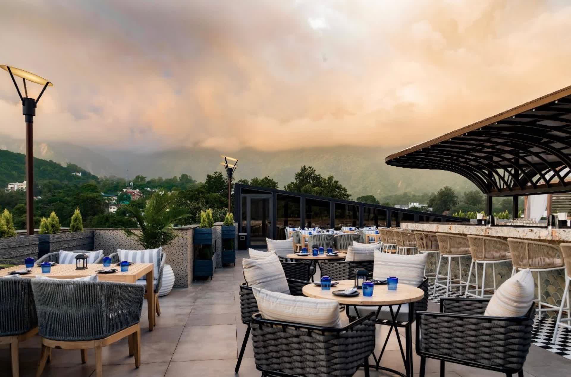 Sunset over the Mussoorie hills from the Farzi Café Dehradun rooftop